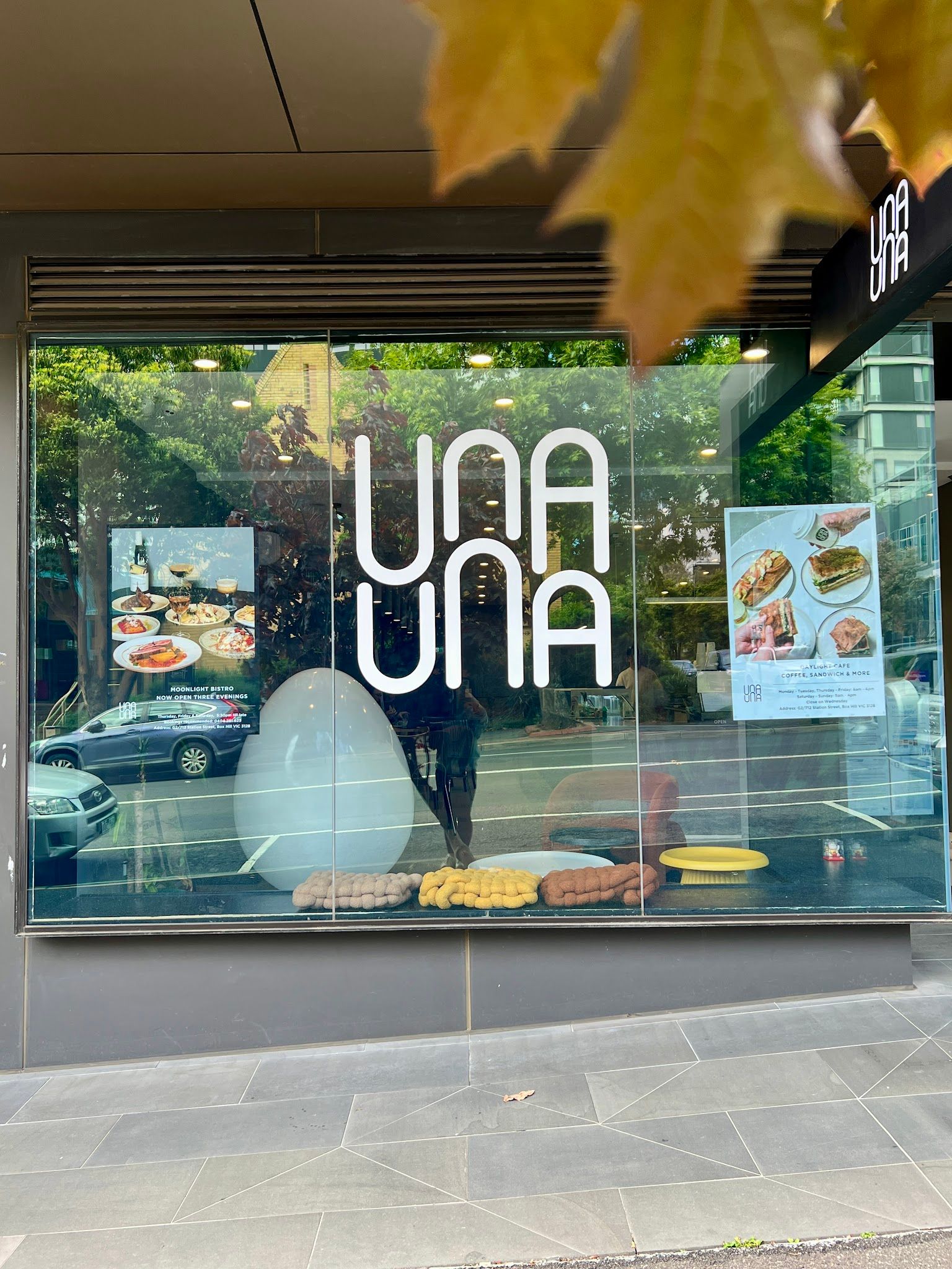 Una Una shopfront with the angular white UNA UNA wordmark across the window
